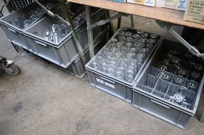 Lot 740 - Four heavy duty stacking crates containing...