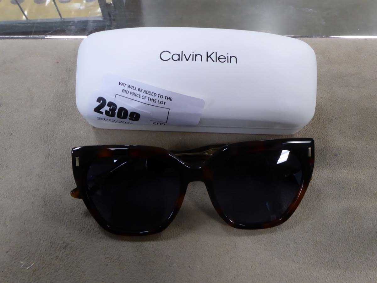 Lot 2309 - Pair of Calvin Klein ladies sunglasses in case
