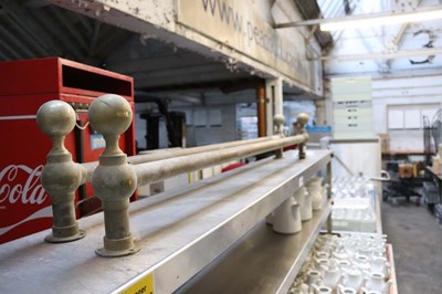 Lot 750 - Two 160cm brass bar type foot rests