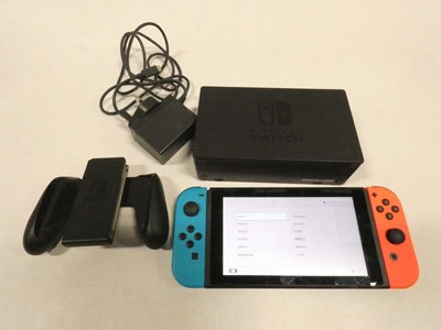 Lot 2059 - Nintendo Switch with charging base, charger...