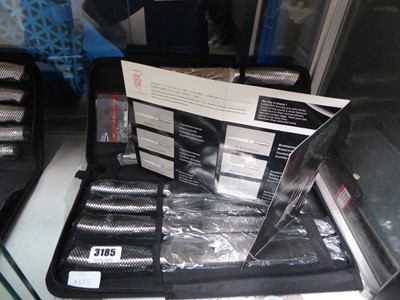 Lot 3185 - Canvas cased nine piece Japan triple hardened...