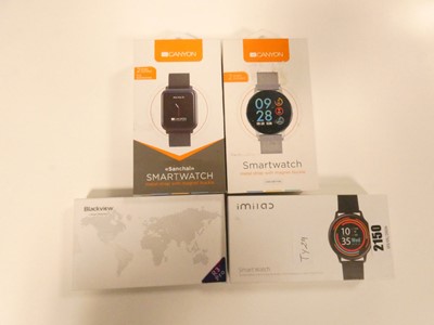 Lot 2150 - Four boxed Smart watches