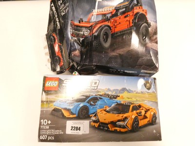 Lot 2204 - Two boxed Lego sets. Lego Technic Ford Bronco...