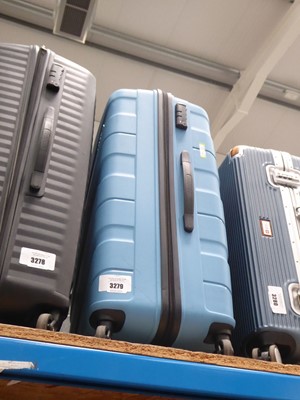 Lot 3279 - Blue hard shelled American Tourister wheeled...