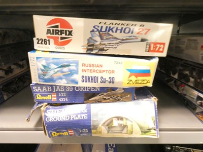 Lot 2261 - Four boxed model kits, an Airfix Flanker B...