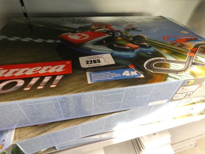 Lot 2265 - Four boxed Mario Kart Carrera Go racing track...