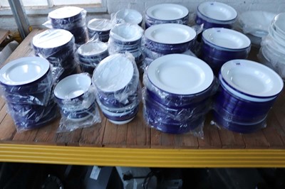 Lot 288 - Collection of white and blue rimmed enamelware...