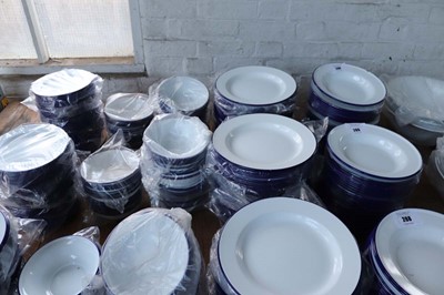 Lot 289 - Collection of white and blue rimmed enamelware...