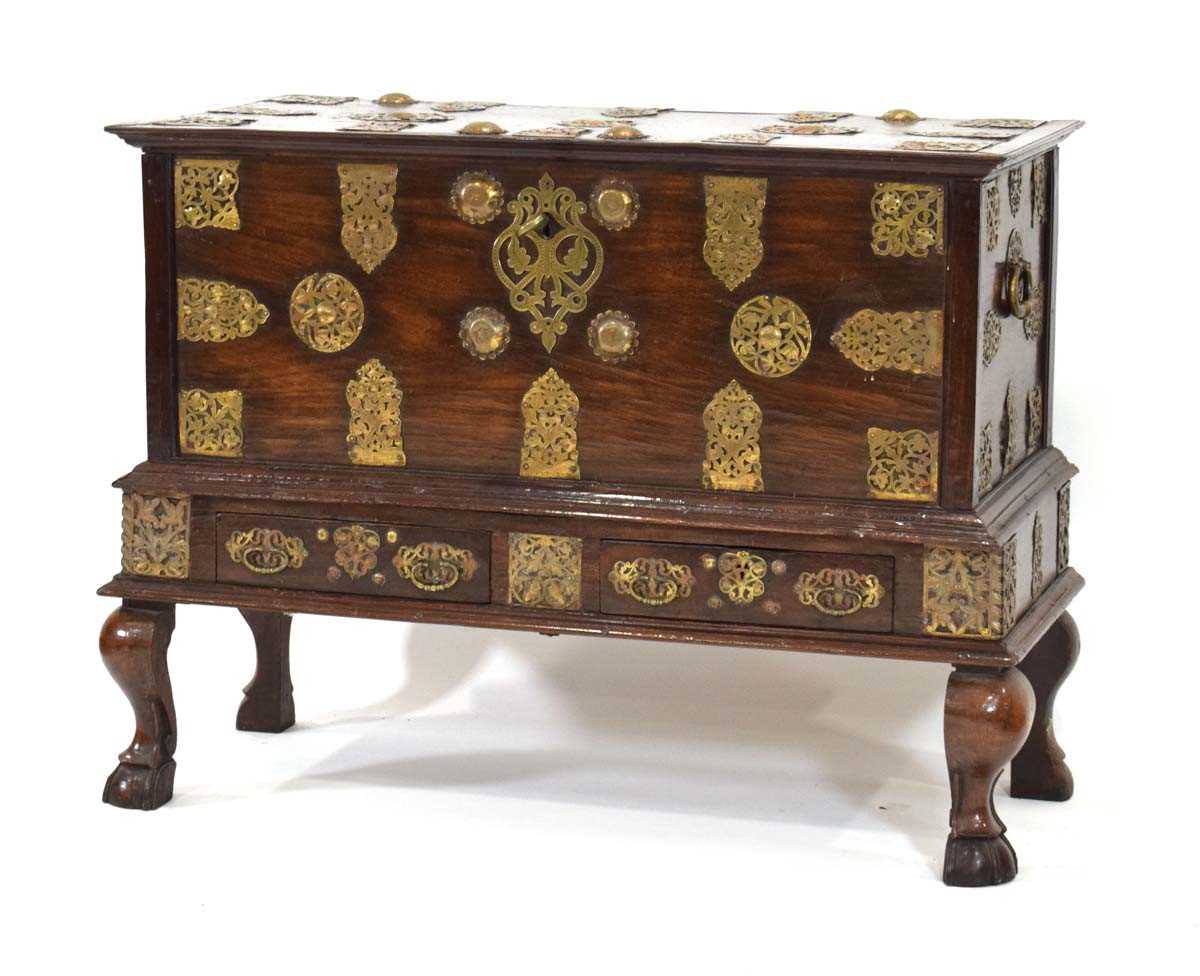 Lot 17 - A 'Zanzibar' chest with brass studs and...