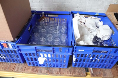 Lot 389 - 4 blue stacking crates containing various...