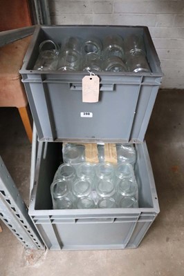 Lot 390 - 2 plastic stacking crates containing jam style...