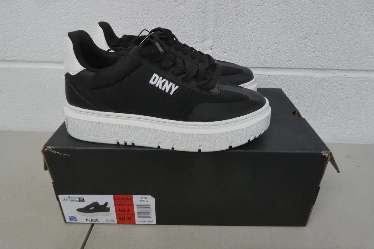 Lot A boxed pair of DKNY midland lace up sneakers...