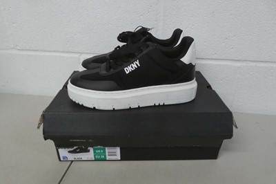 Lot A boxed pair of DKNY midland lace up sneakers...