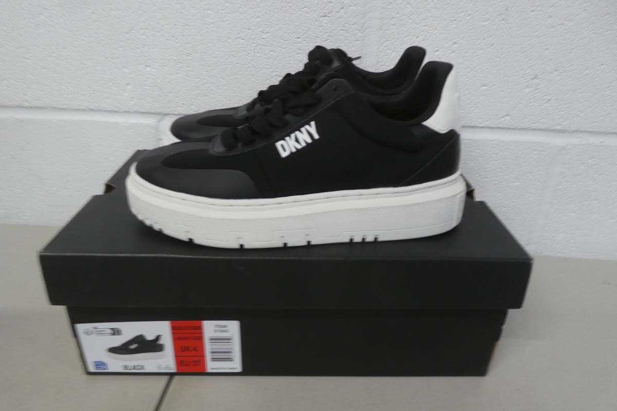 Lot A boxed pair of DKNY midland lace up sneakers...