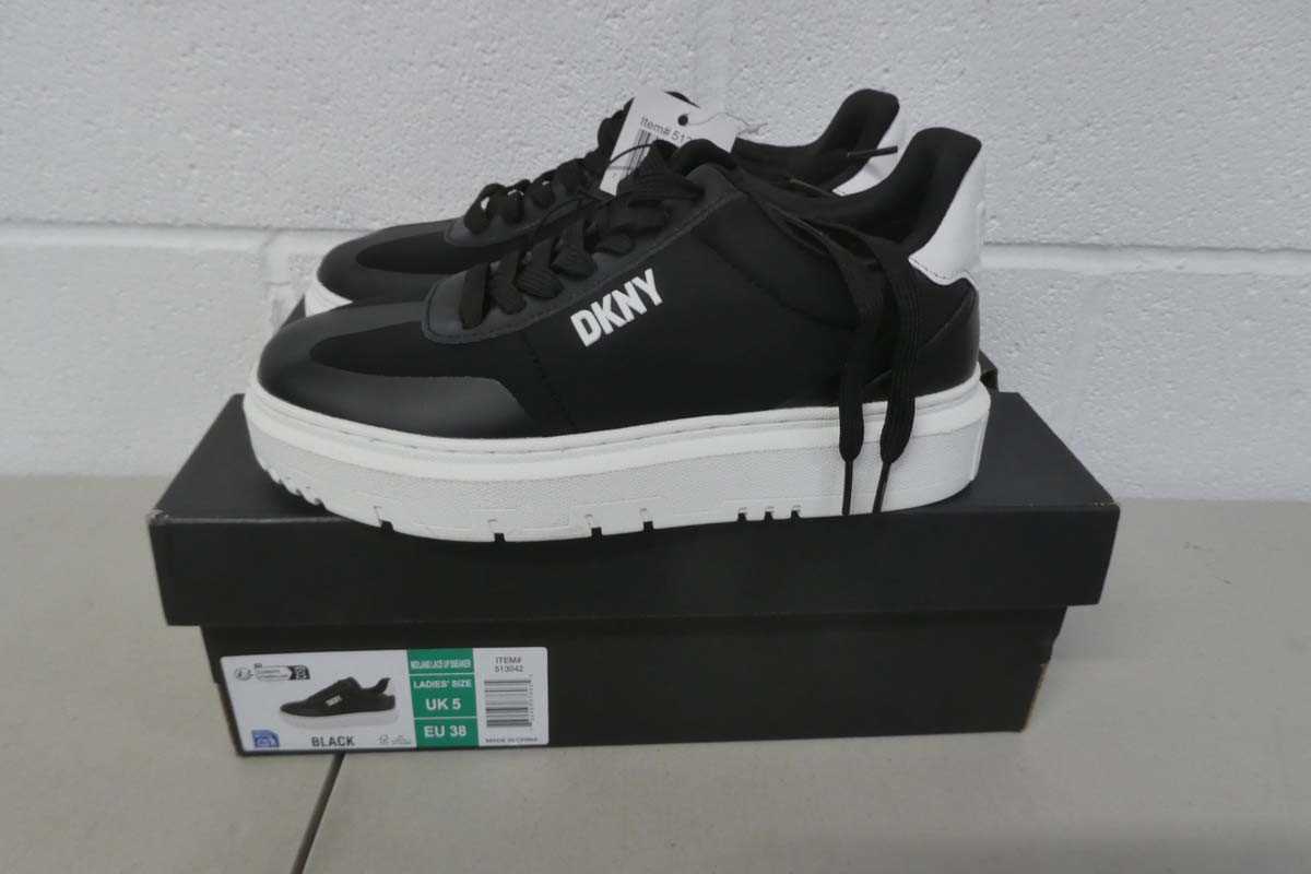 Lot A boxed pair of DKNY midland lace up sneakers...