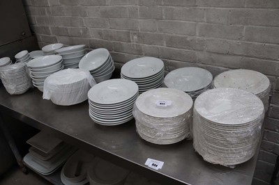 Lot 835 - Table top of white crockery bowls in various...