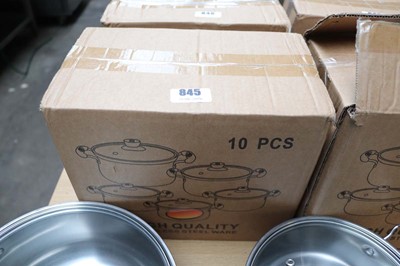 Lot 845 - Ten piece stainless steel and glass lid pan...