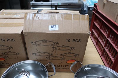 Lot 847 - Ten piece stainless steel and glass lid pan...
