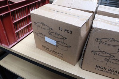 Lot 848 - Ten piece stainless steel and glass lid pan...