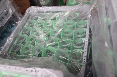 Lot 1049 - Six stacking crates of thirty-six 8oz poly...