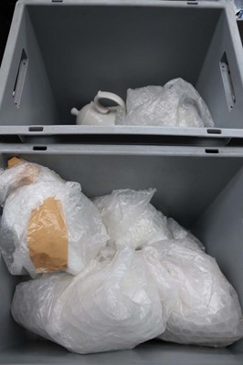 Lot 1062 - Two plastic crates containing crockery teapots