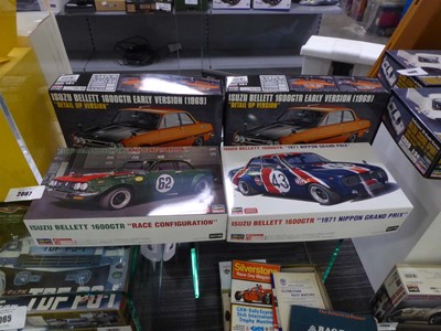Lot 2067 - Four boxed Japanese car model kits depicting...
