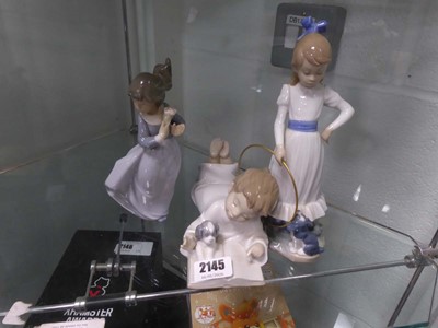 Lot 2145 - 3 Lladro figures - 2 of girls and 1 of a boy...