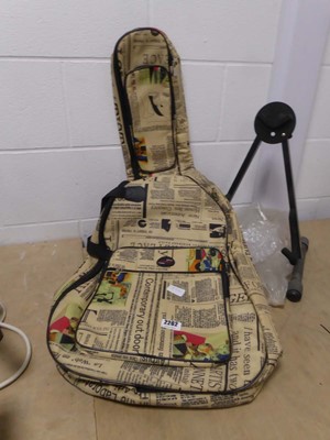 Lot 2262 - Guitar case with newspaper print design