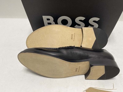 Lot 3706 - Hugo Boss tayil loafers in black size UK11 -...