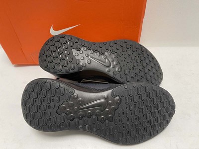 Lot 3717 - Nike revolution 7 trainers in black size UK5.5...