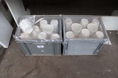 Lot 1134 - Two stacking crates containing white ceramic...