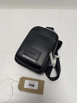 Lot 3756 - Coach New York racer sling bag