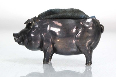 Lot 296 - An Edwardian silver pin cushion modelled as a...