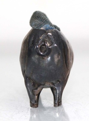 Lot 296 - An Edwardian silver pin cushion modelled as a...
