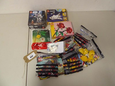 Lot 3979 - An assortment of Lego, includes 3 boxed and...