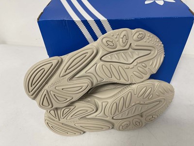 Lot 3856 - Adidas ozweego trainers in brown size UK10 -...