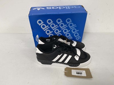 Lot 3857 - Adidas rivalry low trainers in black size...