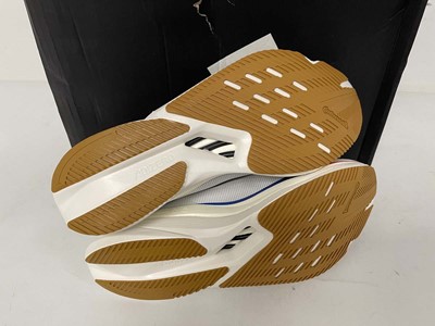 Lot 3914 - Adidas adizero boston 12 trainers in white...