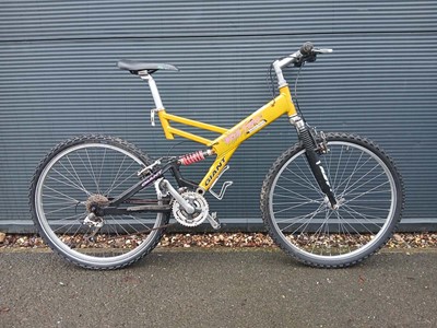 Lot 4050 - Giant orange dual-suspension bike