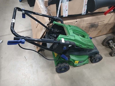 Lot 4143 - Powerbase electric lawn mower with charger