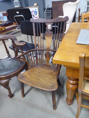 Lot 5118 - Georgian elm seated stick back elbow chair