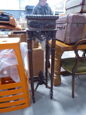 Lot 5137 - Heavily carved torchere