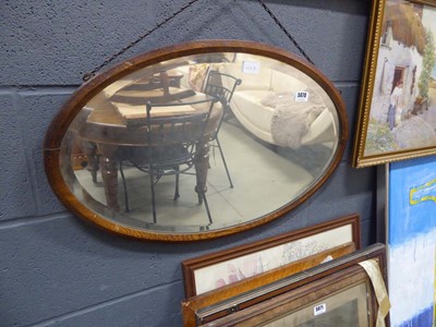 Lot 5070 - Oval bevelled mirror in oak frame