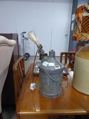 Lot 5099 - Industrial style table lamp formed from an oil...