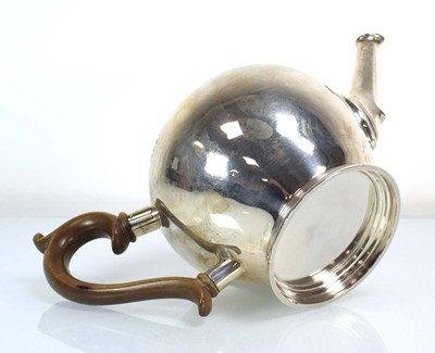 Lot 334 - A silver teapot of spherical form, makers mark...