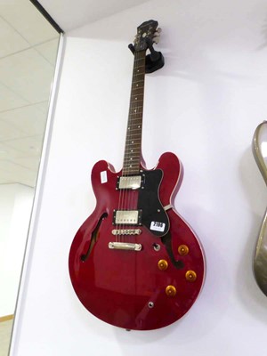 Lot 2196 - Epiphone six string electric guitar in red and...