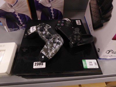 Lot 2305 - PlayStation 4 along with two controllers