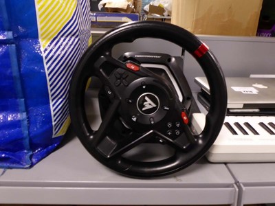 Lot 2311 - Thrustmaster steering wheel and pedals