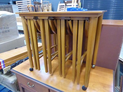 Lot 5256 - Teak table with 4 folding tables nesting under