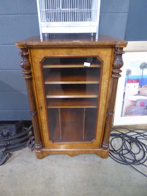 Lot 5278 - Walnut music cabinet with single glazed door